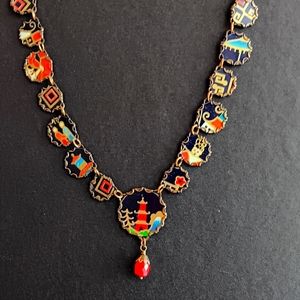 CHINEESE UNIQUE necklace.  Unable to find another.  15 charms. One beutyful beed